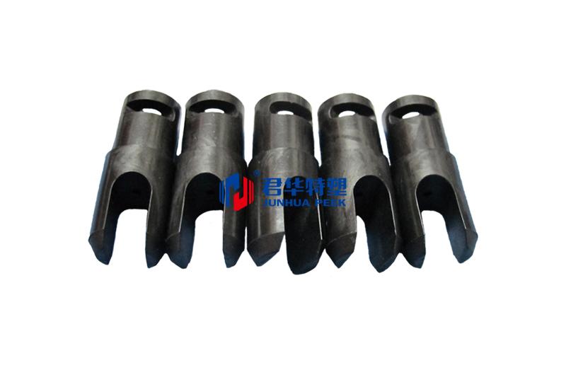 PEEK clamp rail column for bottle rinser assembly