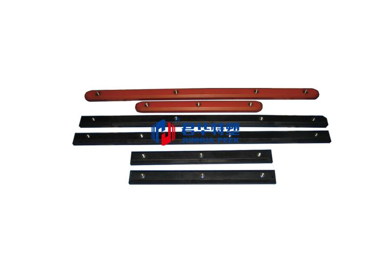 PEEK track wear strip