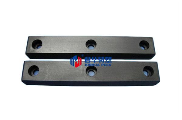 PEEK rail wear strips
