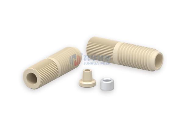 PEEK split fitting with stainless steel blade sleeve